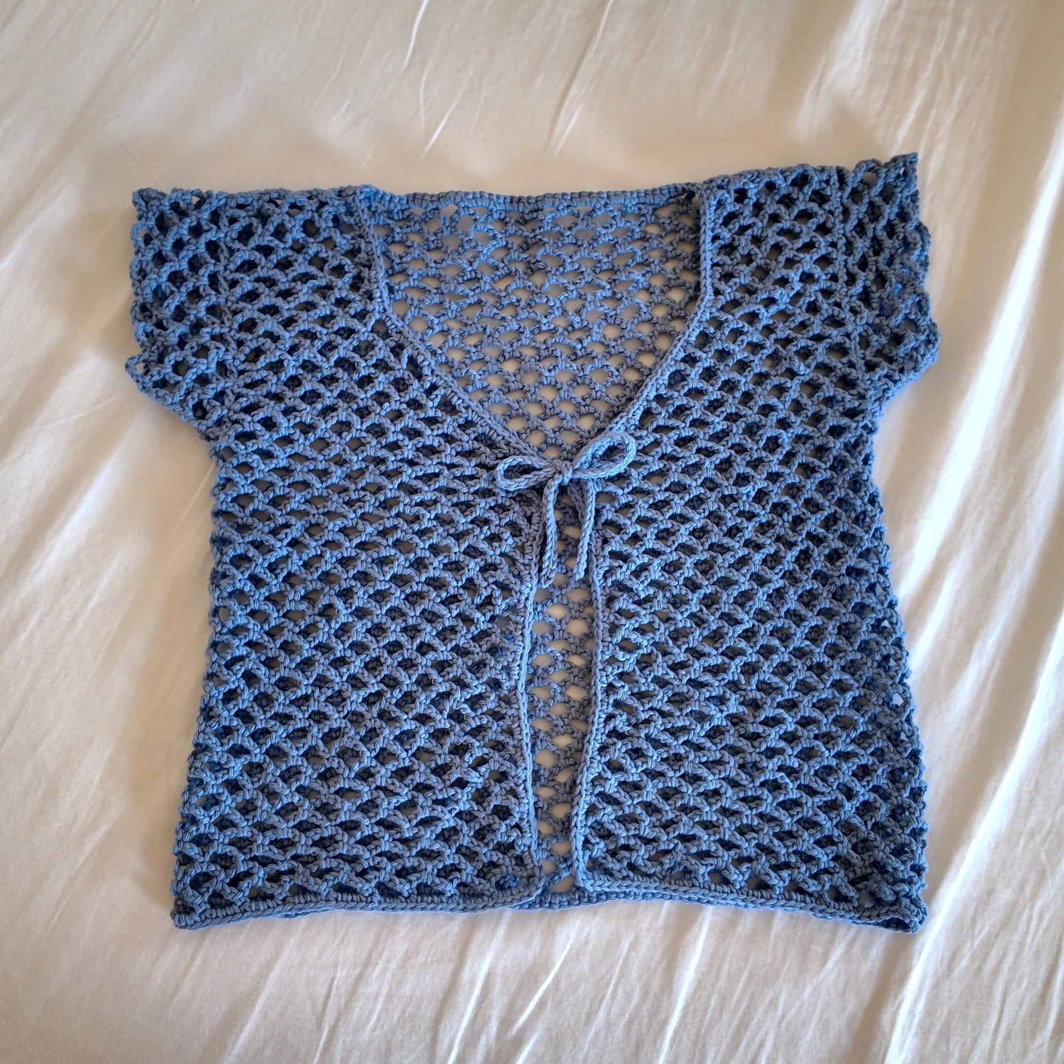 crochet mesh top flat lay