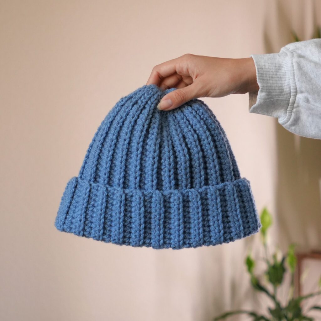 crochet ribbed beanie held
